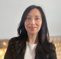 Head and shoulders image of woman with long black hair wearing black blazer and white shirt. Dr. Ana Maria Gonzalez-Barrero.
