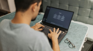 Man using chatgpt on a laptop